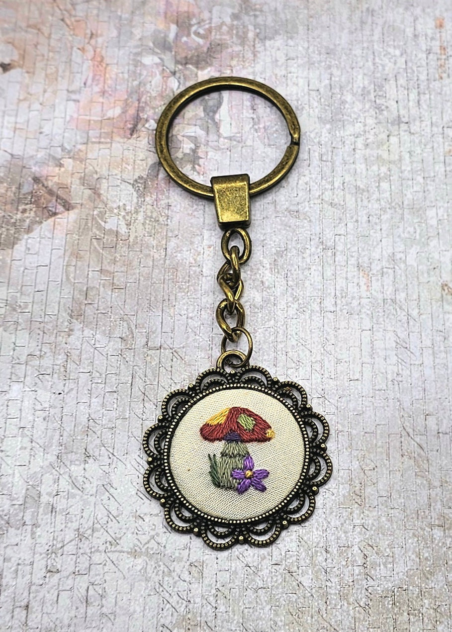 Handmade brass hand embroidered key chain