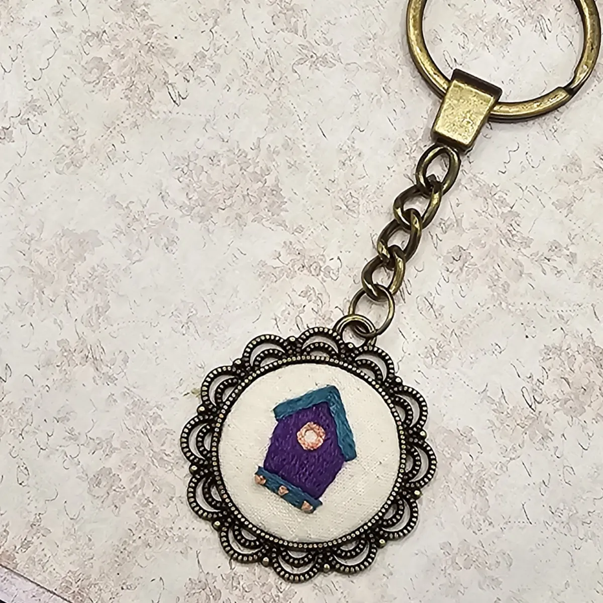 Bird House Brass Keychain